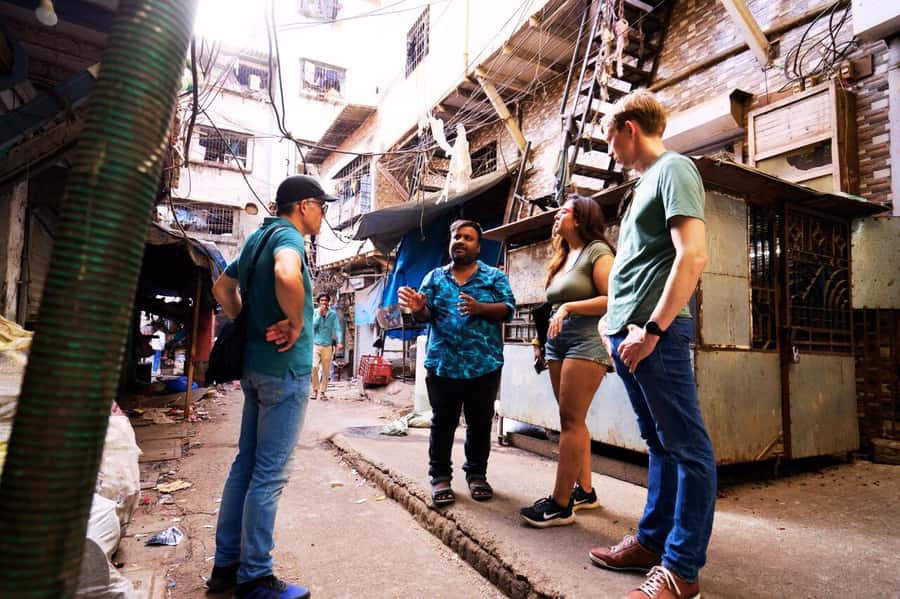 Dharavi: Daily Life inside Asia's Largest Slum walking tour - Residential alleys: kids playing, women chatting, and the hard stuff too
