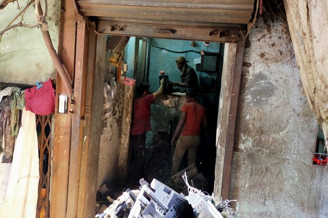 Dhobi Ghat (Open Air Laundry) with Dharavi Slum Guided Tour - Recycling area and plastic pellets: the process you can actually trace