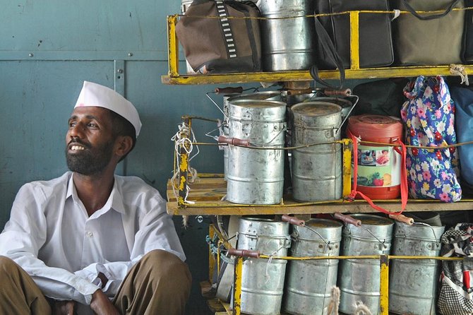 Morning Life of Mumbai's Dabbawalas and Dhobis Tour - Churchgate station: dabbawalas unloading, sorting, and getting ready