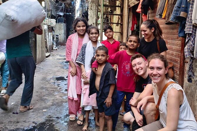 Mumbai: Dhobi Ghat Laundry & Dharavi Slum Tour with a Local - The Local Train Ride: Mumbai’s Motion in a Short Window