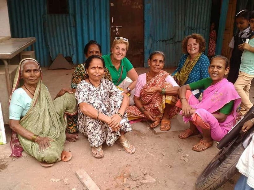 Mumbai: Private Dhobi Ghat Laundry & Slum Tour with Pickup - Dhobi Ghat first, then Dharavi: how the day flows