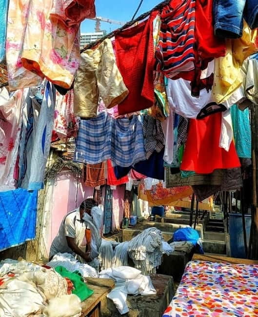 Mumbai: Private Dhobi Ghat Laundry & Slum Tour with Pickup - Dharavi with a local guide: community, not a postcard
