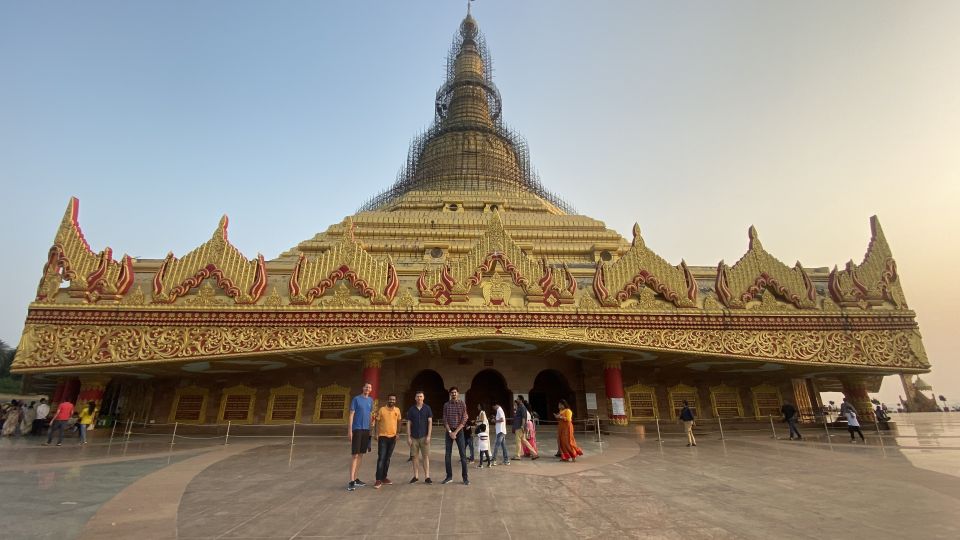 Mumbai: Private tour for Kanheri Caves and Golden Pagoda - Inside the main hall: 7-meter Buddha, 34 pillars, and Avalokiteshwara
