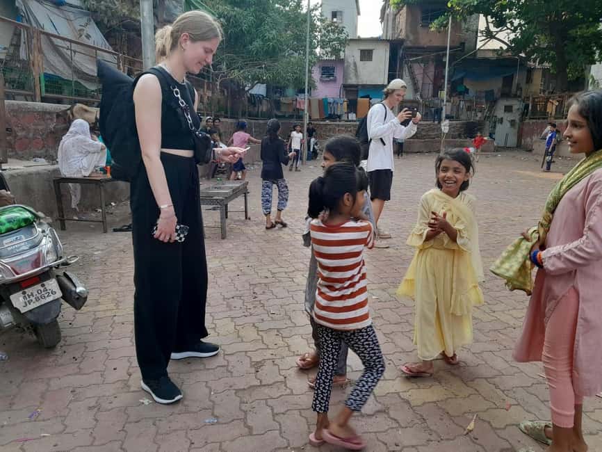 Mumbai Slum Tour - Visit Dharavi Slum with Local Guide - Practical rules for cameras, clothing, and comfort