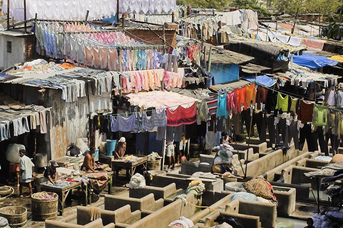 Private Dharavi Slum, Dabbawala & Dhobi Ghat tour with Transport - Stop 1: Churchgate Railway Station and the dabbawallas in action